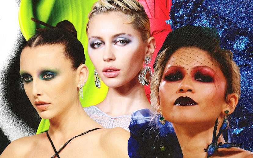 Three women with dramatic makeup and hairstyles against vibrant green, red, and blue backgrounds.