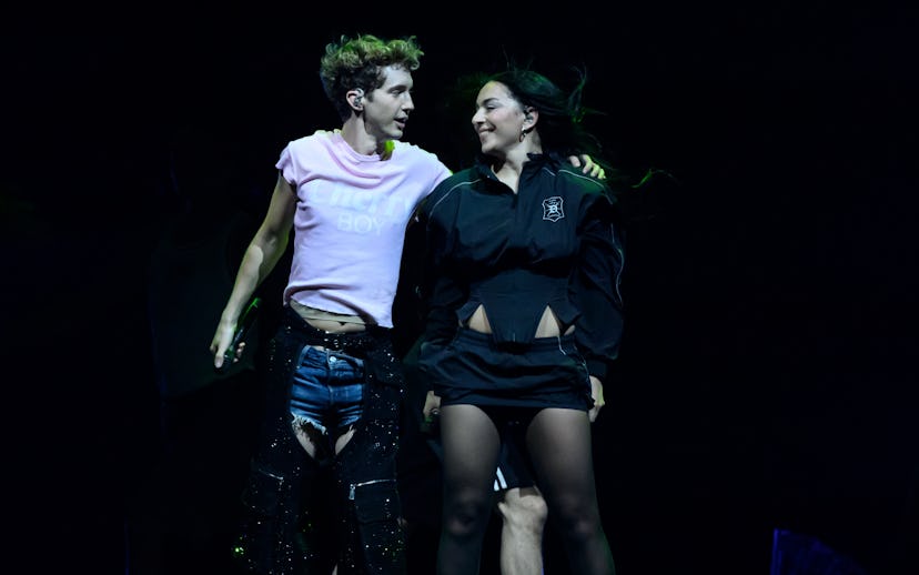 LONDON, ENGLAND - JUNE 27: Charli XCX joins Troye Sivan on stage during the Something to Give Each O...