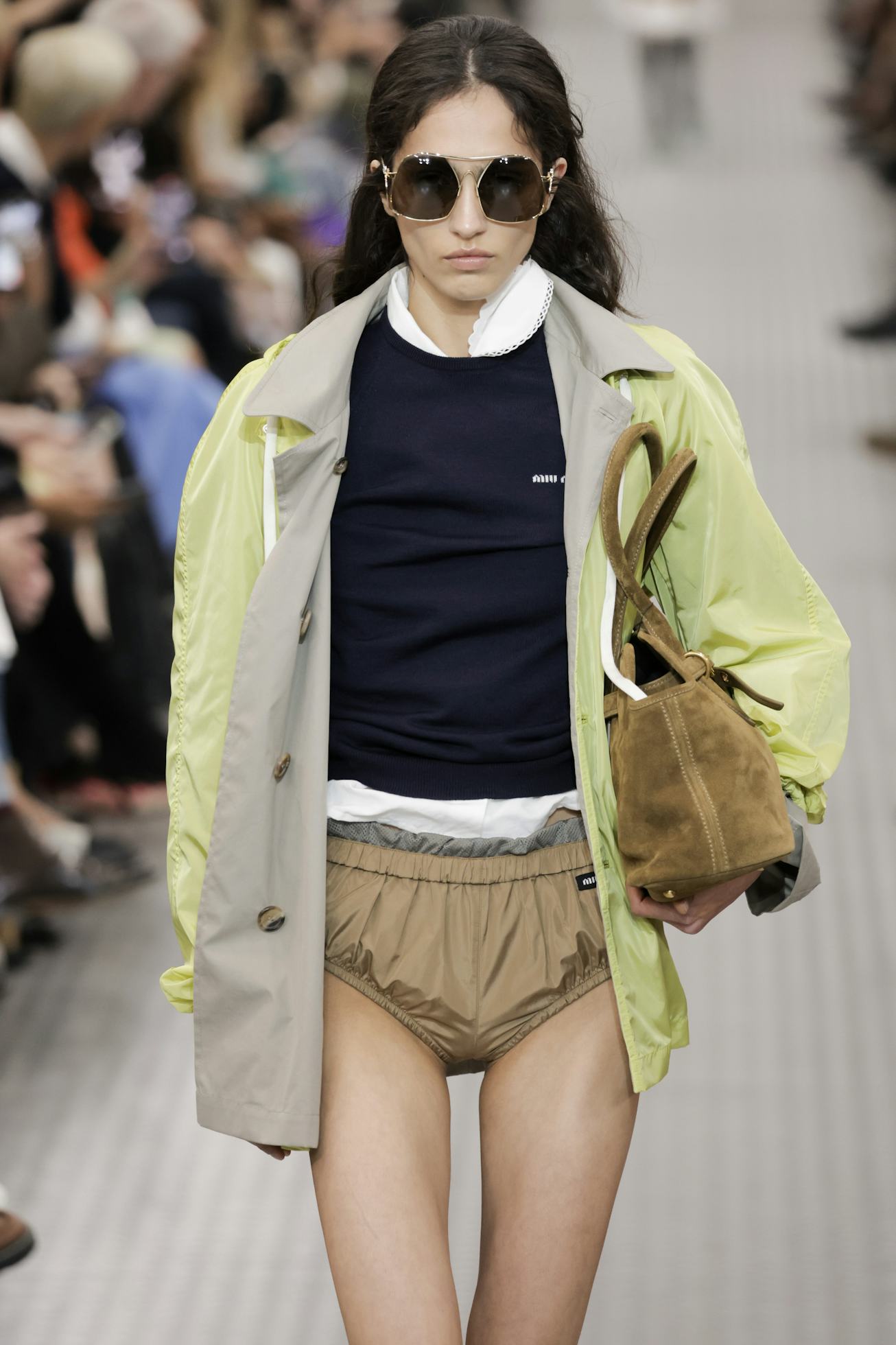 PARIS, FRANCE - OCTOBER 01: A model walks the runway during the Miu Miu Ready to Wear Spring/Summer ...