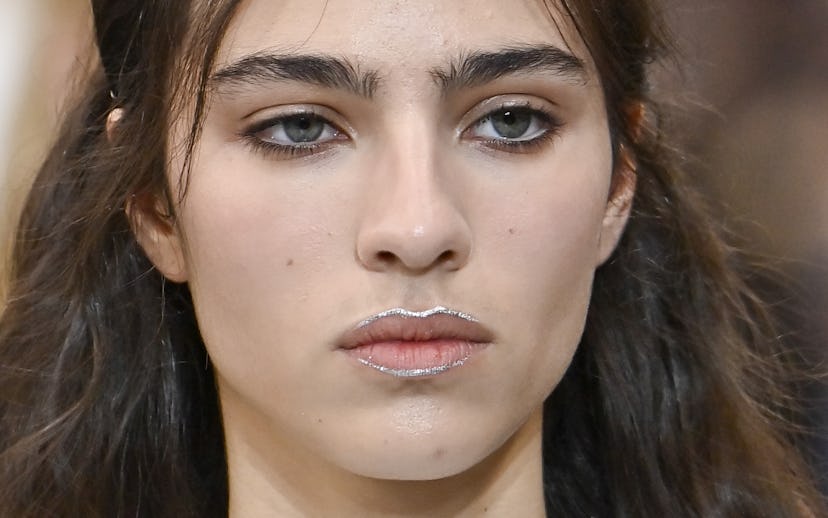 PARIS, FRANCE - OCTOBER 01: A model walks the runway during the Miu Miu Ready to Wear Spring/Summer ...